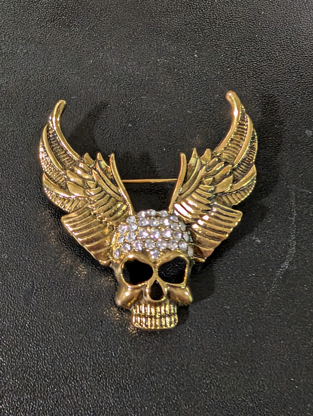 Gold Winged Skull Brooch Pin